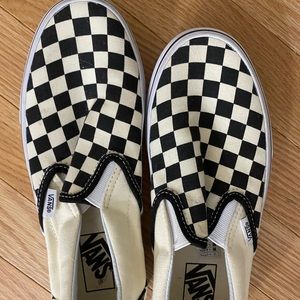 Black and white checkered slip on vans